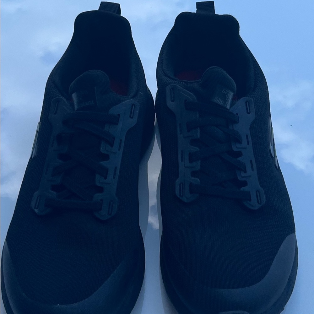 Black used Skechers